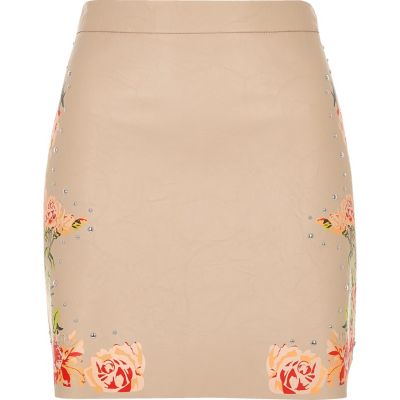 Blush pink faux leather floral mini skirt